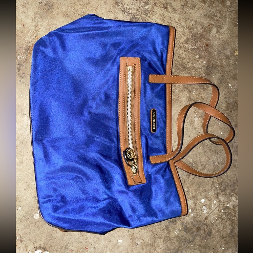 Michael Kors. Blue and Brown with tan interior. Used, like new.